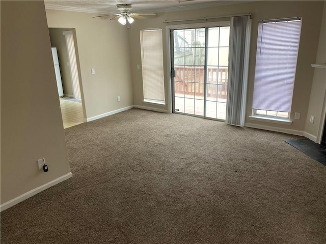 6448 Charter Way, Lithonia, GA 30058 - carpeted empty room with a ceiling fan, crown molding, and baseboards