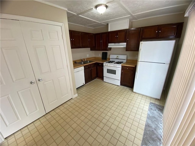 6448 Charter Way, Lithonia, GA 30058 - kitchen with white appliances, under cabinet range hood, a sink, and light countertops