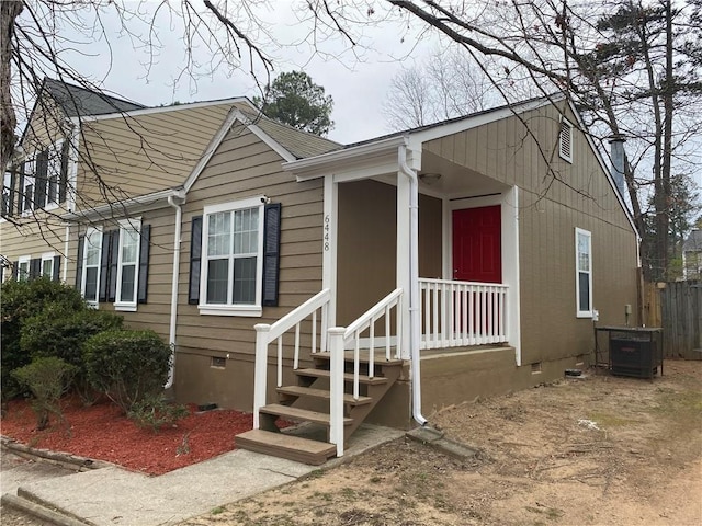 6448 Charter Way, Lithonia, GA 30058 - view of front of home with crawl space, central air condition unit, and fence