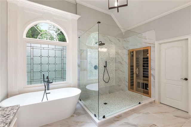 5173 Brendlynn Dr, Suwanee, GA 30024 - bathroom with ornamental molding, lofted ceiling, a freestanding tub, a shower stall, and marble finish floors