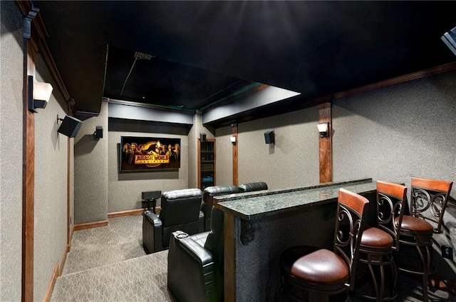 5173 Brendlynn Dr, Suwanee, GA 30024 - cinema with baseboards, carpet floors, a textured wall, and a bar