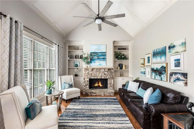 5173 Brendlynn Dr, Suwanee, GA 30024 - living room with wood finished floors, a ceiling fan, built in features, and a stone fireplace