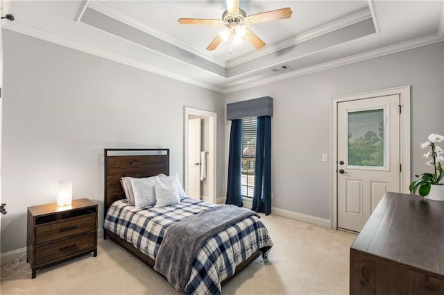 5173 Brendlynn Dr, Suwanee, GA 30024 - bedroom with light colored carpet, a tray ceiling, ornamental molding, baseboards, and a ceiling fan
