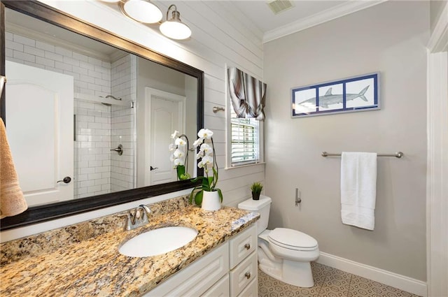 5173 Brendlynn Dr, Suwanee, GA 30024 - full bath with vanity, crown molding, toilet, tiled shower, and baseboards