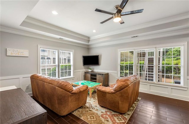 5173 Brendlynn Dr, Suwanee, GA 30024 - living room with a decorative wall, a raised ceiling, ornamental molding, a ceiling fan, and dark wood-style floors