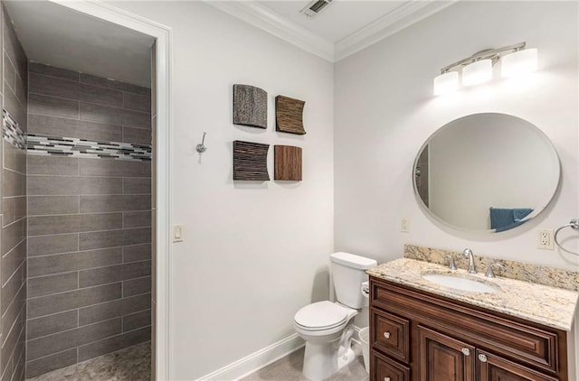 5173 Brendlynn Dr, Suwanee, GA 30024 - bathroom with vanity, tiled shower, toilet, ornamental molding, and baseboards
