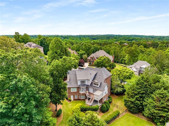 5173 Brendlynn Dr, Suwanee, GA 30024 - view of subject property with a heavily wooded area