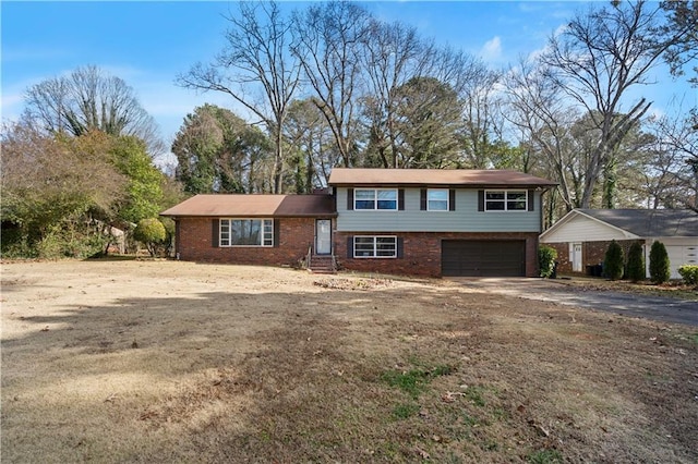 split level home featuring a garage