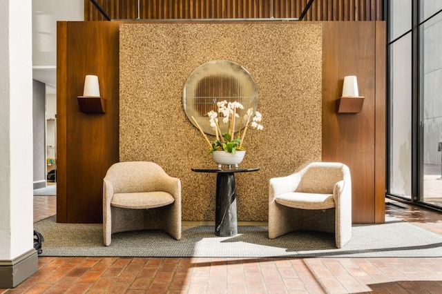 living area with an inviting chandelier