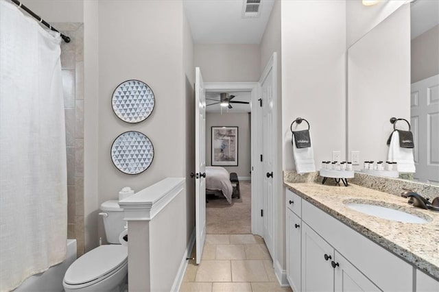 full bathroom featuring shower / bath combo, toilet, tile patterned floors, and vanity