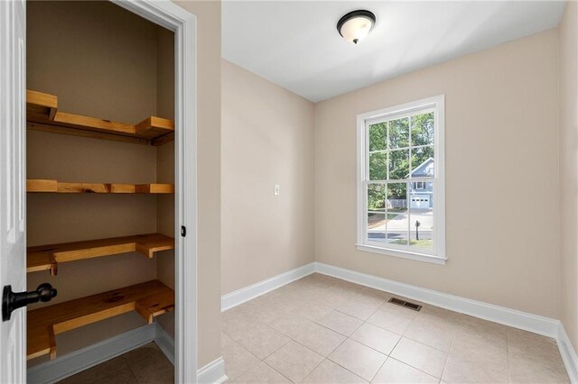 view of tiled empty room