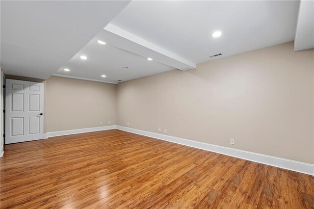 basement featuring light wood-type flooring