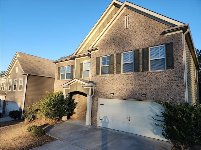 view of front of property featuring a garage