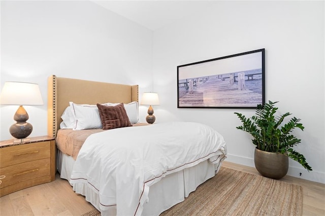 567 Ponce De Leon Ave NE Unit 614, Atlanta, GA 30308 - bedroom with light wood-type flooring and baseboards