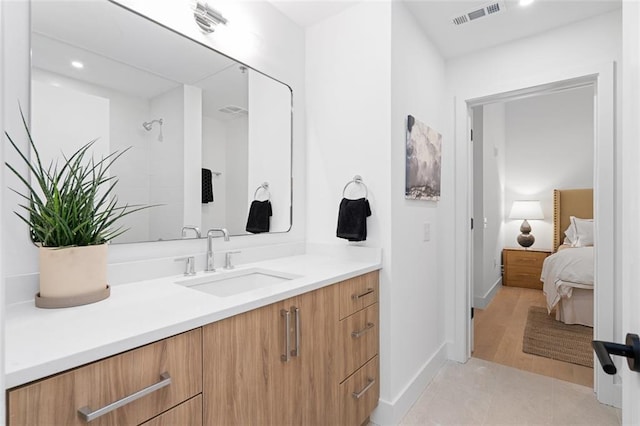 567 Ponce De Leon Ave NE Unit 614, Atlanta, GA 30308 - ensuite bathroom featuring vanity, baseboards, and recessed lighting