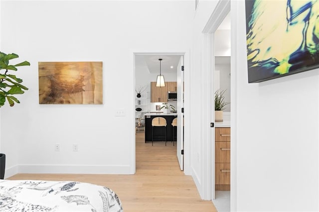 567 Ponce De Leon Ave NE Unit 614, Atlanta, GA 30308 - bedroom with light wood-type flooring and baseboards