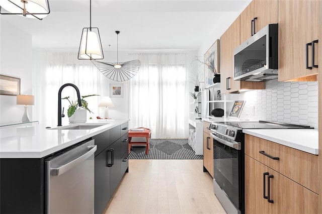 567 Ponce De Leon Ave NE Unit 614, Atlanta, GA 30308 - kitchen featuring appliances with stainless steel finishes, a sink, light countertops, and modern cabinets