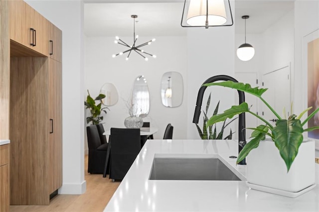 567 Ponce De Leon Ave NE Unit 614, Atlanta, GA 30308 - kitchen with modern cabinets, light countertops, and a sink