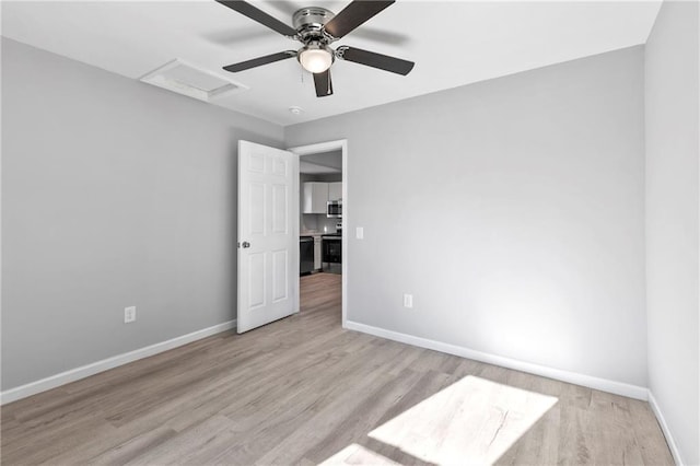 empty room with light wood-type flooring