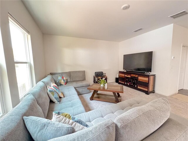 living room with light carpet