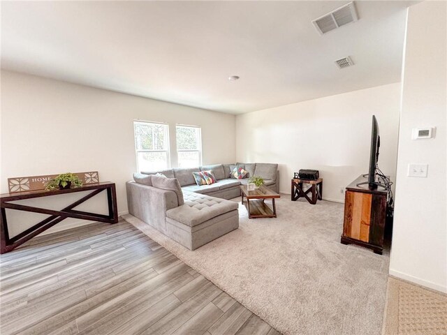 living room featuring light hardwood / wood-style floors