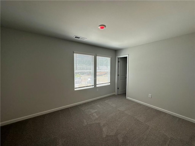 142 Tye St, Stockbridge, GA 30281 - carpeted empty room featuring baseboards