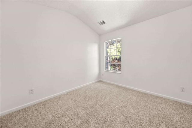 2736 Parkway Trl, Lithonia, GA 30058 - carpeted spare room with vaulted ceiling and baseboards