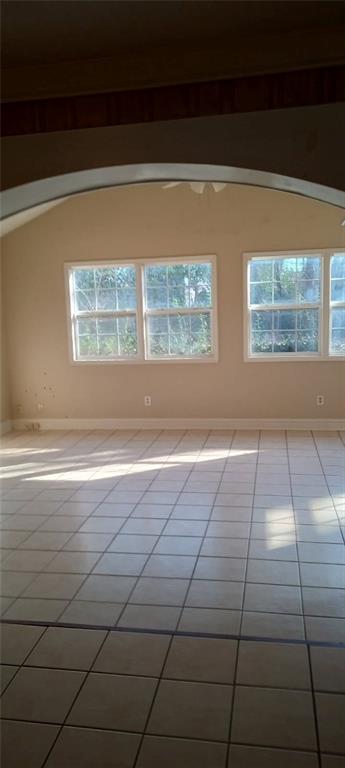 view of tiled spare room