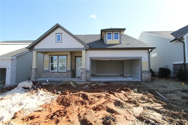 craftsman inspired home with a garage