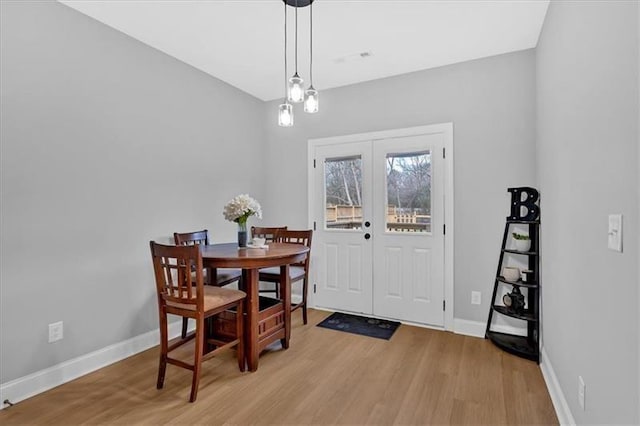 40 Crayton St, Rockmart, GA 30153 - dining room with light wood finished floors and french doors