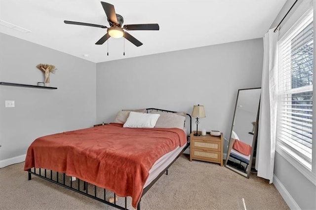 40 Crayton St, Rockmart, GA 30153 - carpeted bedroom featuring multiple windows and ceiling fan