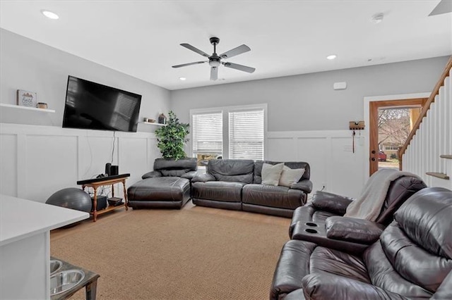 40 Crayton St, Rockmart, GA 30153 - living room featuring a decorative wall, stairway, ceiling fan, wainscoting, and recessed lighting