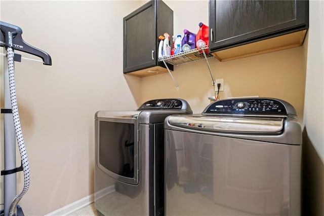 5285 Winflow Way, Suwanee, GA 30024 - washroom with cabinet space, washing machine and clothes dryer, and baseboards