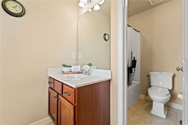 5285 Winflow Way, Suwanee, GA 30024 - full bathroom with toilet, vanity, baseboards, tile patterned flooring, and shower / bath combo