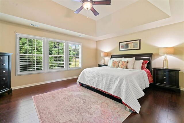 5285 Winflow Way, Suwanee, GA 30024 - bedroom featuring hardwood / wood-style floors, baseboards, a raised ceiling, and ceiling fan