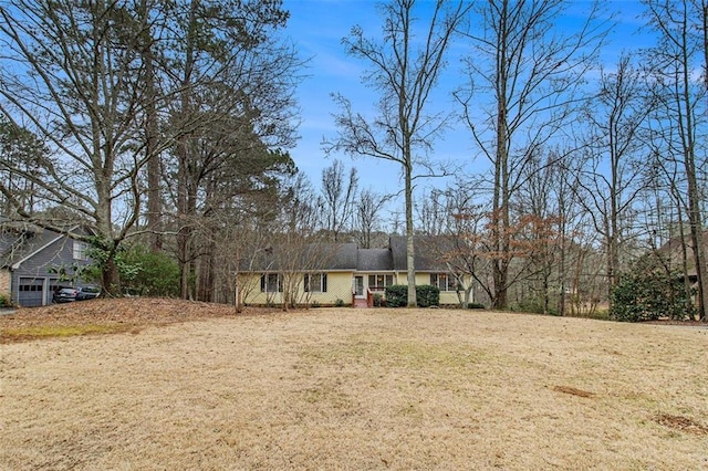 view of front of home with a front lawn