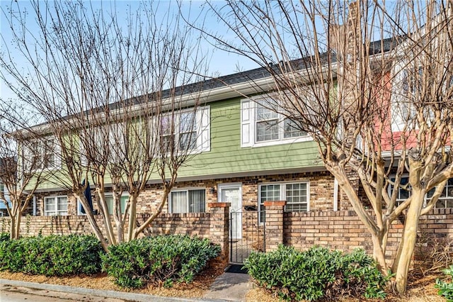 view of front of property with brick siding