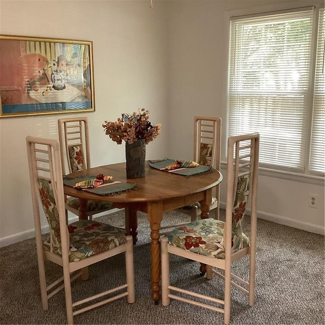 307 Adair St Unit 7-E, Decatur, GA 30030 - carpeted dining area with baseboards