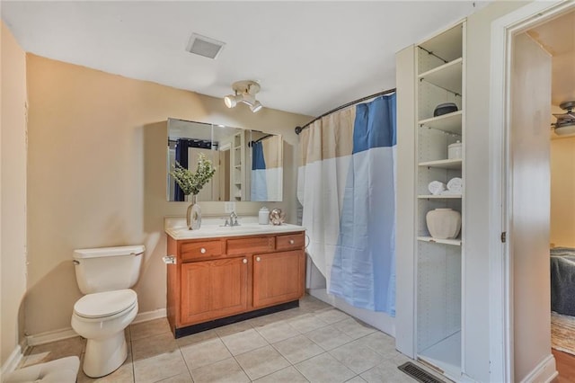 full bath featuring tile patterned flooring, toilet, vanity, visible vents, and a shower with curtain