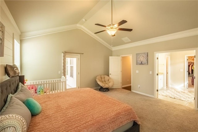 bedroom with crown molding, lofted ceiling, carpet flooring, and ceiling fan