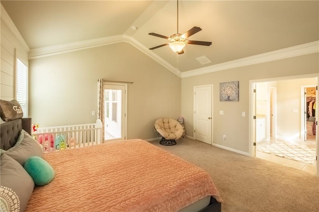 carpeted bedroom featuring vaulted ceiling, ceiling fan, and crown molding