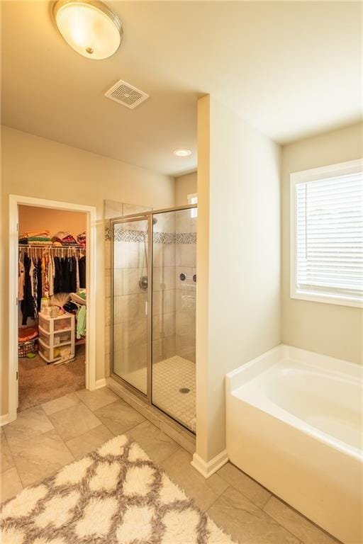 bathroom with plus walk in shower