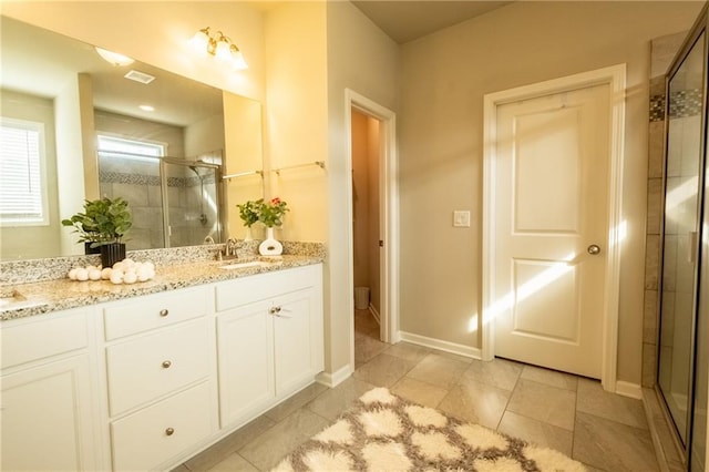 bathroom featuring vanity and walk in shower