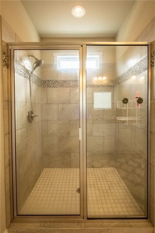 bathroom with an enclosed shower