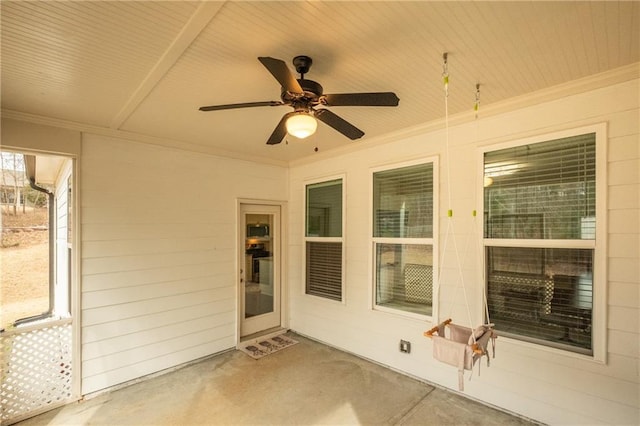 exterior space with ceiling fan