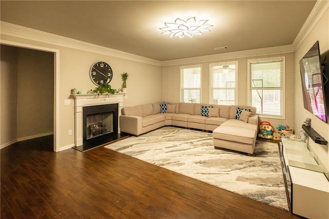 living room with ornamental molding and dark hardwood / wood-style flooring