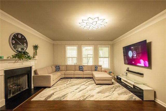 living room featuring dark wood-type flooring and ornamental molding