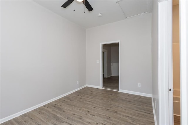 unfurnished room featuring ceiling fan and hardwood / wood-style floors