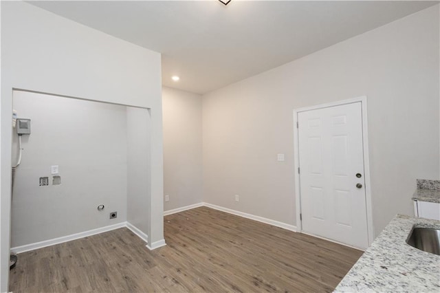 washroom with washer hookup, dark hardwood / wood-style flooring, and electric dryer hookup