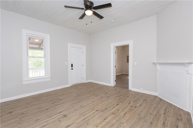 unfurnished living room featuring ceiling fan and light hardwood / wood-style floors